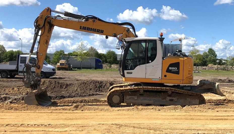 Bagger bei Entwässerungsarbeiten (Regen- und Schmutzwasser) für Bauprojekte im Landkreis Celle – SWM Erdbau